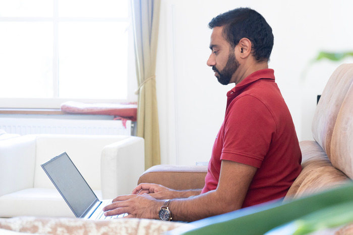 Close-up of a yoga teacher teaching an online live yoga teacher training course
