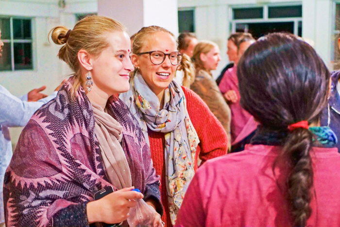 Group of yoga students experiencing Indian ashram welcome
