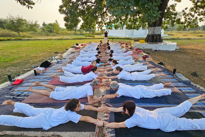 Group yoga practice during ashram YTT days at Arhanta yoga Ashram
